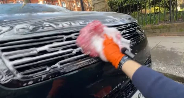 Paint correction and protection product being applied during an Oakland car detail