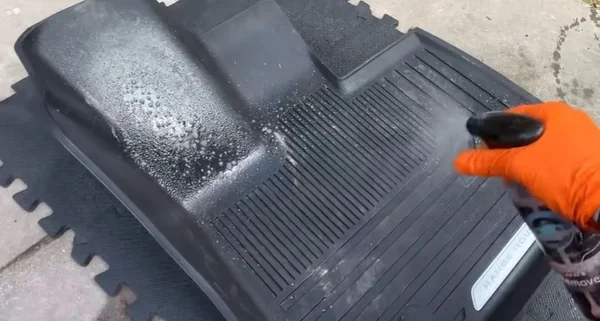 Car floor mats after deep cleaning and hot water extraction