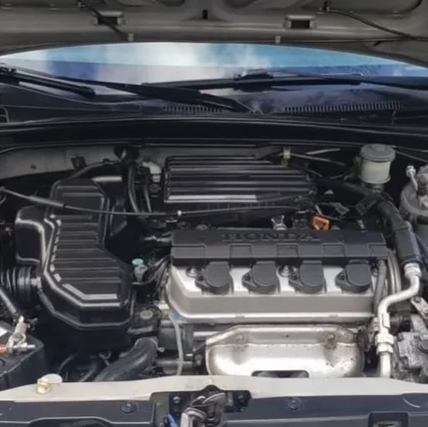 Engine bay detailed and dressed during an auto detailing service in Oakland