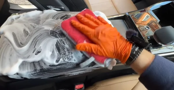Interior car detailing in Oakland — seats, console and carpets deep cleaned inside a customer vehicle
