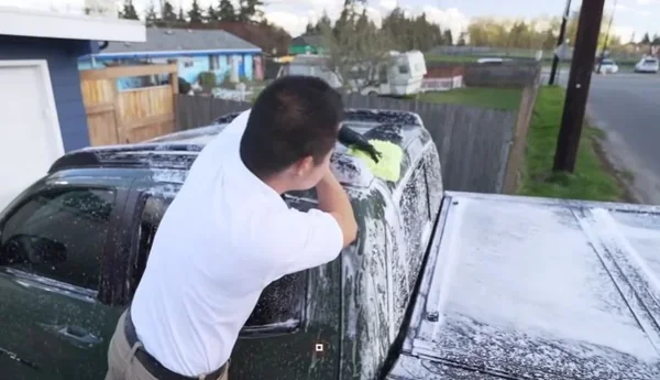 Car roof panel being cleaned during a mobile exterior detail in El Cerrito, CA