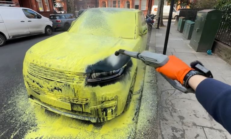 Exterior car detailing in Oakland — pressure rinse before a two-bucket contact wash