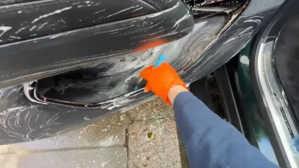 Clean vehicle door panel after hand wash and decontamination in Oakland