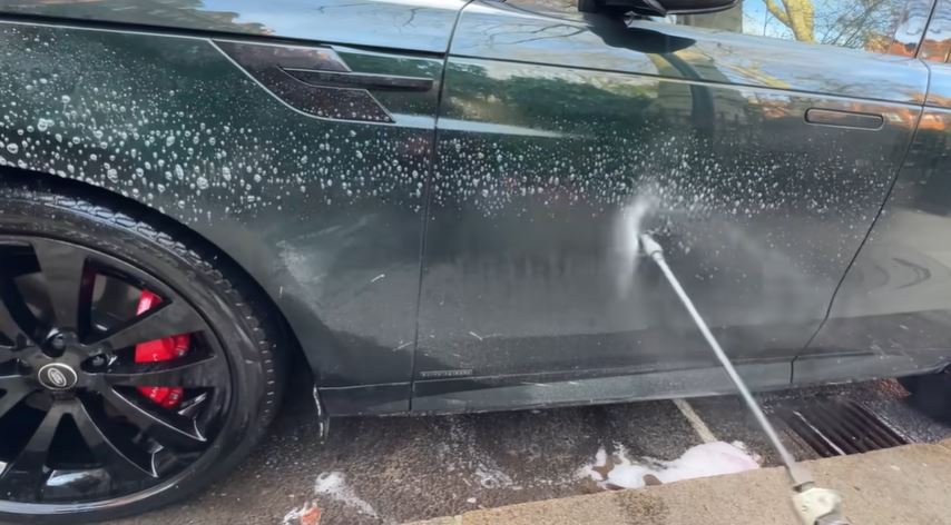 Liquid soap and a detailing tool used during a car wash in Oakland